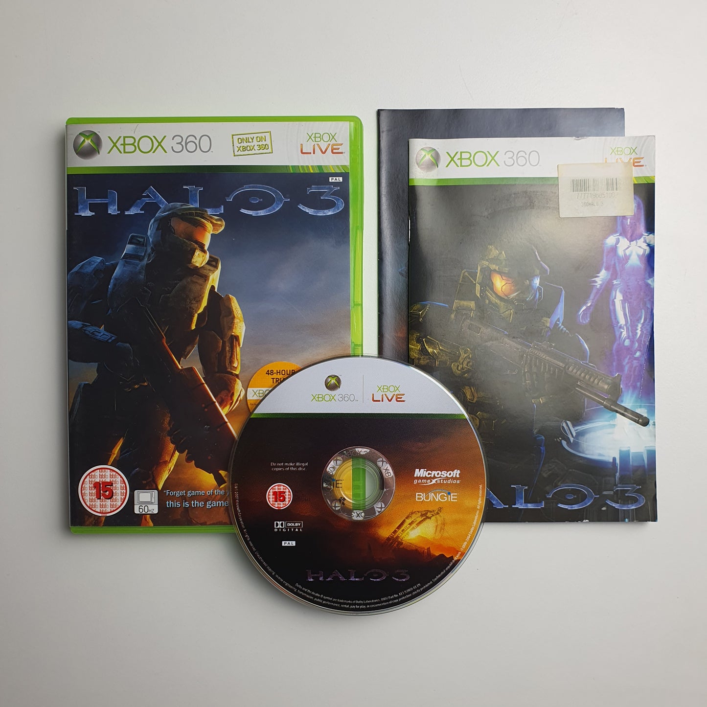 Halo 3 game case, manual and disc on a grey background