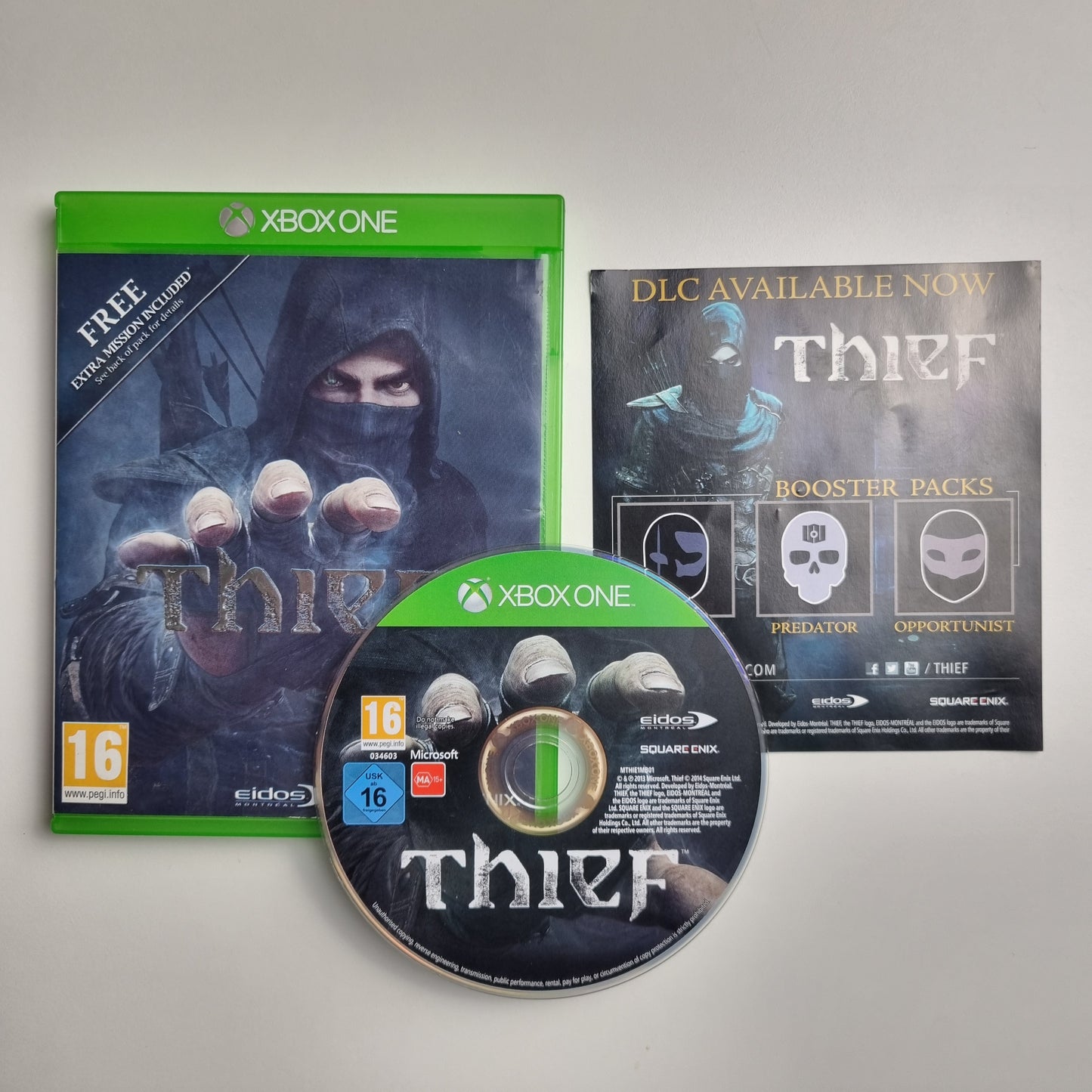 Official Microsoft Xbox One pre-loved game titled 'Thief' with packaging and disc on a light gray background