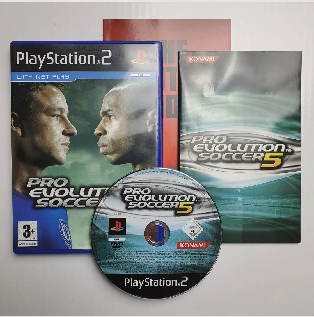 A PlayStation 2 game disc, case and manual for Pro Evolution Soccer 5, with the cover showing two footballers facing each other.