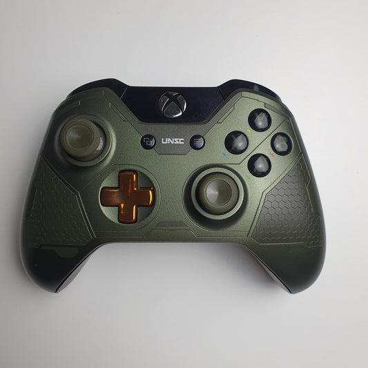 Front of a green & copper coloured Xbox One 'Master Chief' controller on a white background