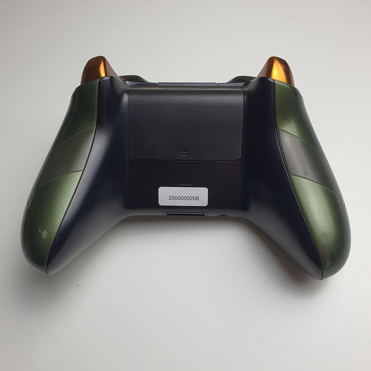 Back of a Xbox One 'Master Chief' controller on a white background