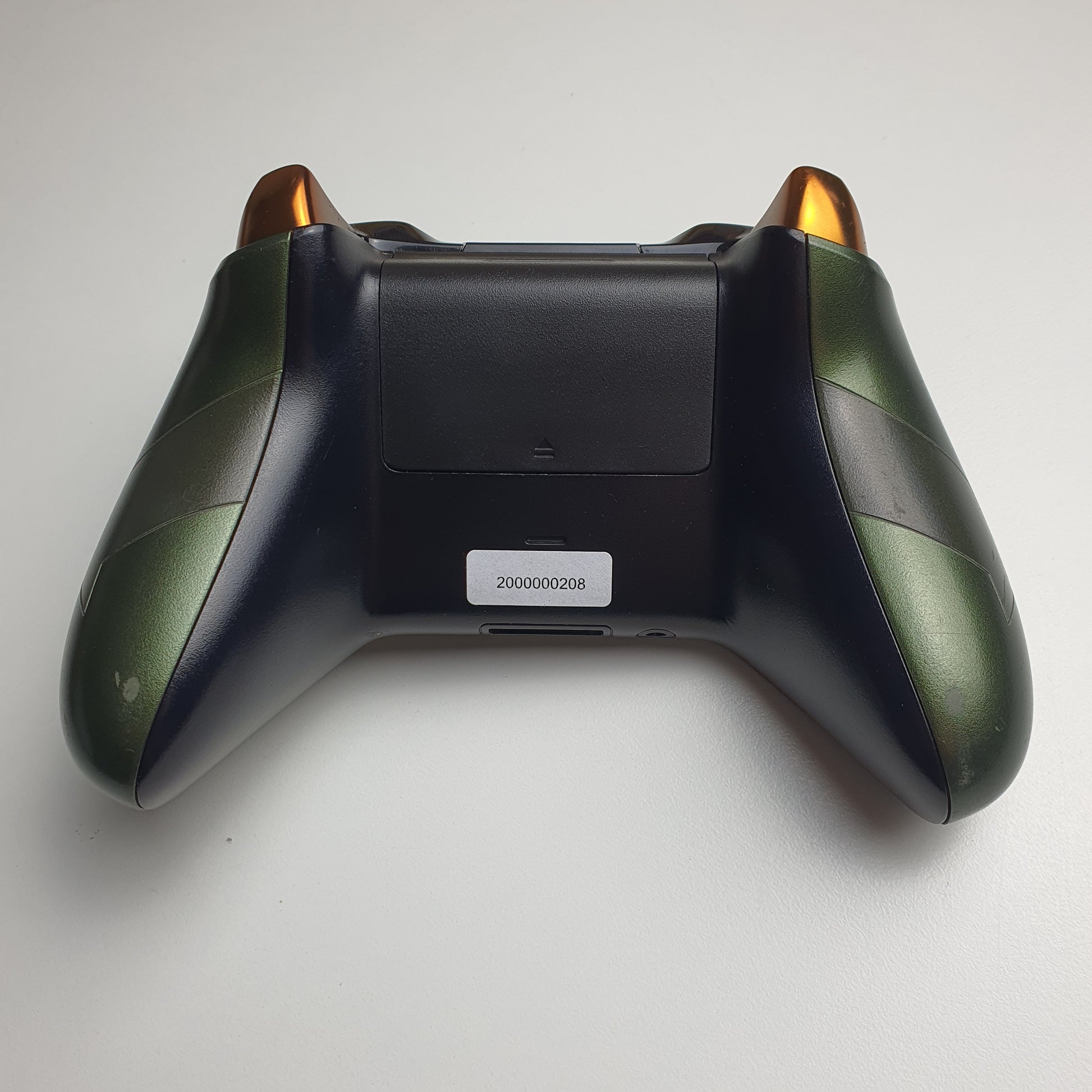 Back of a Xbox One 'Master Chief' controller on a white background
