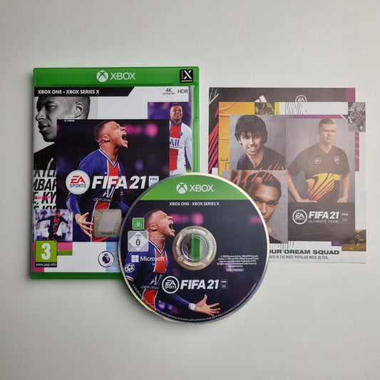 Xbox One & Series X|S game case, disc and inserts for 'FIFA 21' on a light grey background