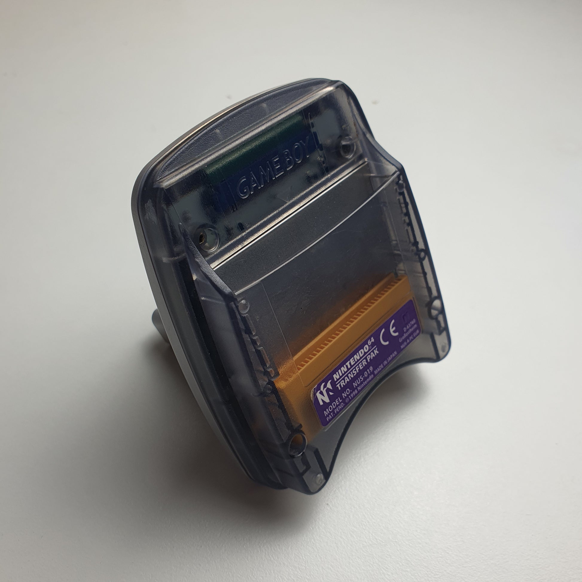 Nintendo 64 N64 transfer pak on a white background