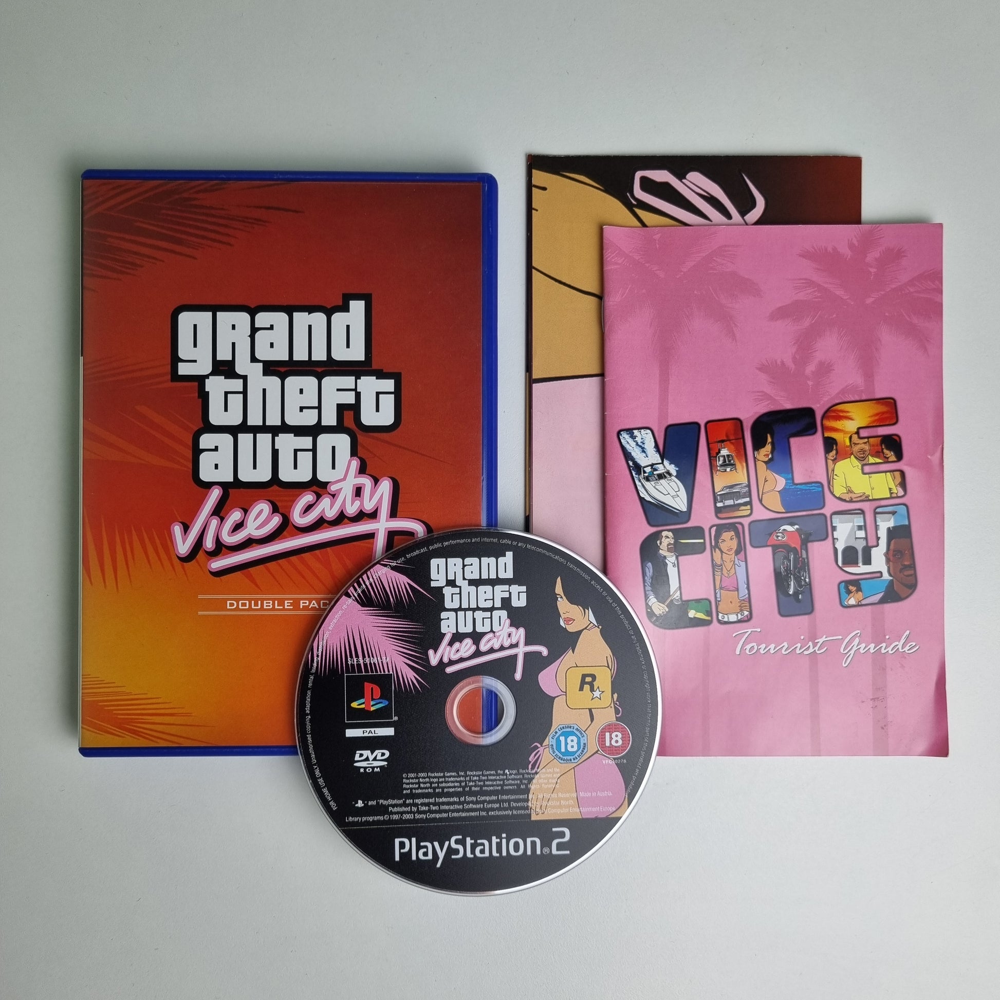Official Sony PlayStation PS2 game disc titled 'Grand Theft Auto Vice City' game disc on a light gray background