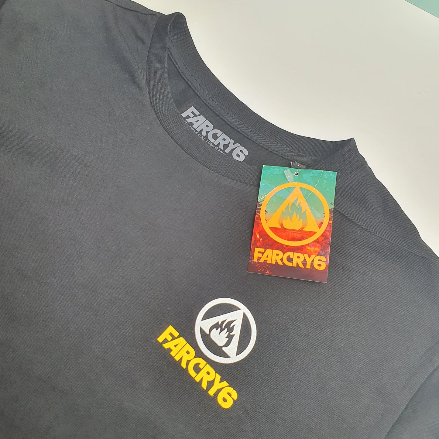 Black T-Shirt with 'Far Cry 6' branding on a white background