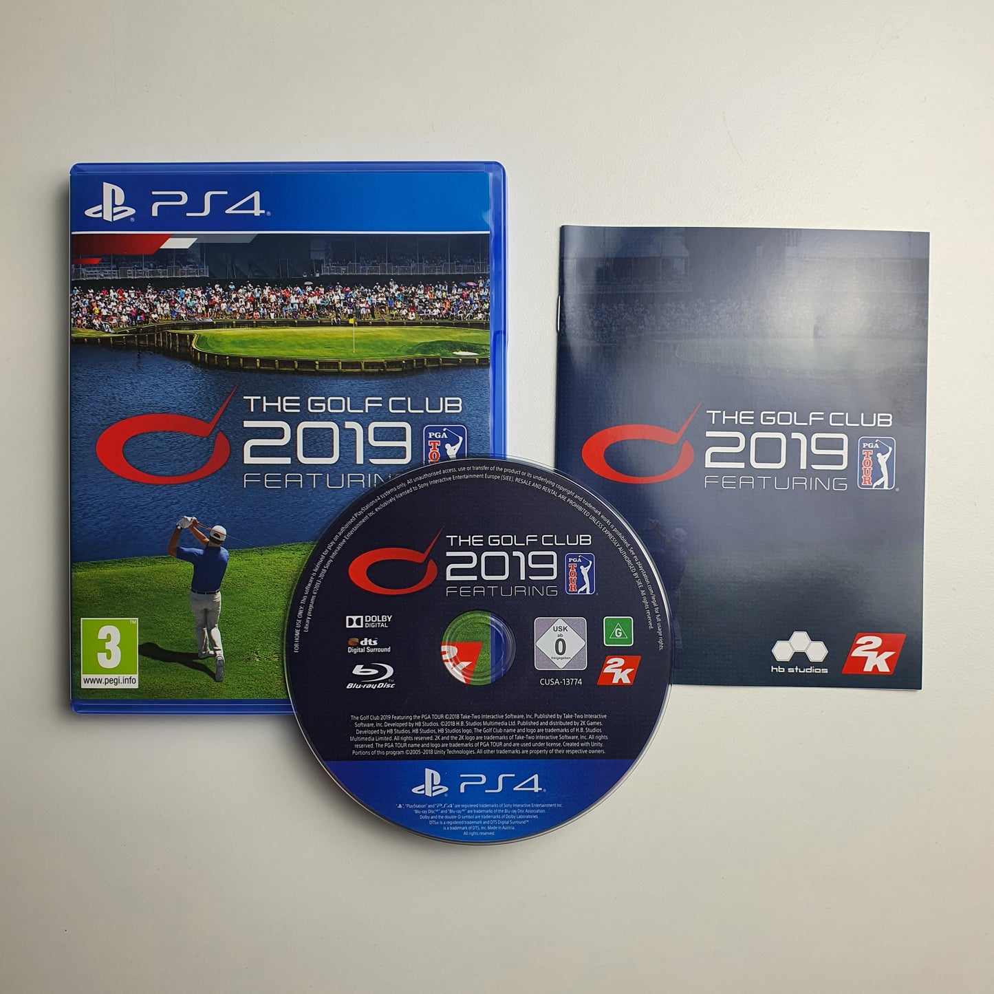 The Golf Club 2019 game case, disc and insert on a white background