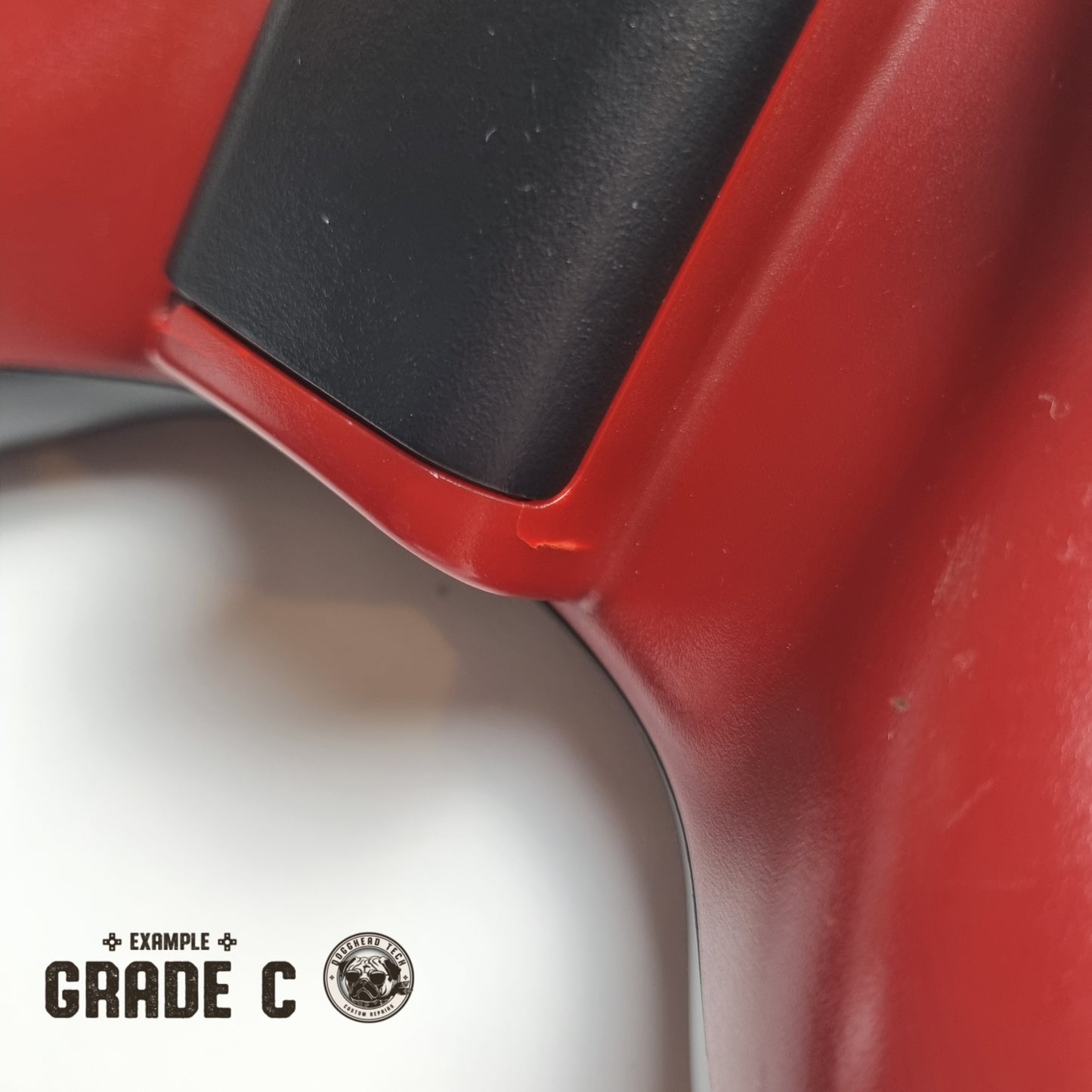 Official Xbox 360 'Gears of War 3' controller showing broken plastic with text in the bottom left corner of the image that reads "Example Grade C".