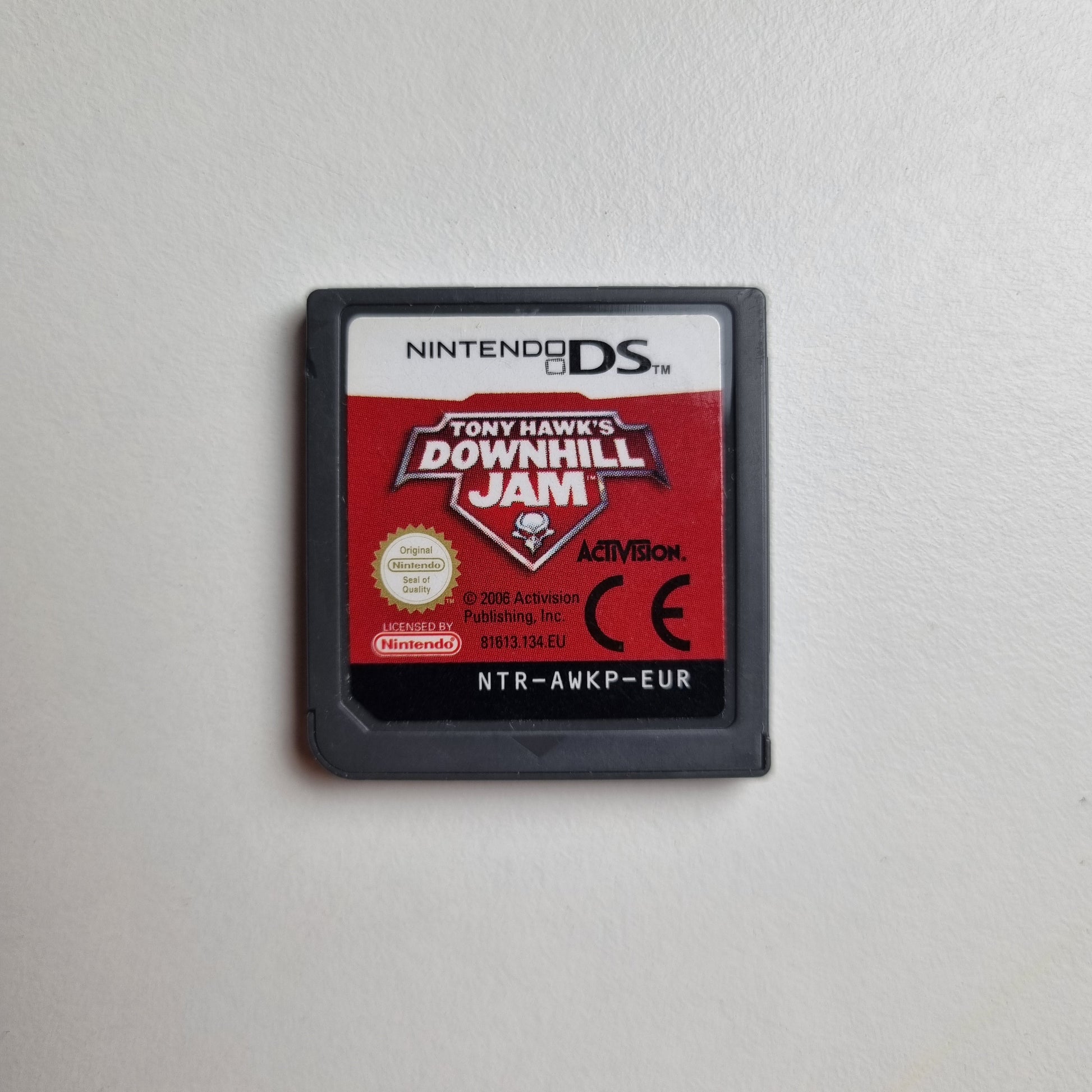 Nintendo DS game cartridge for 'Tony Hawk's Downhill Jam' on a white background