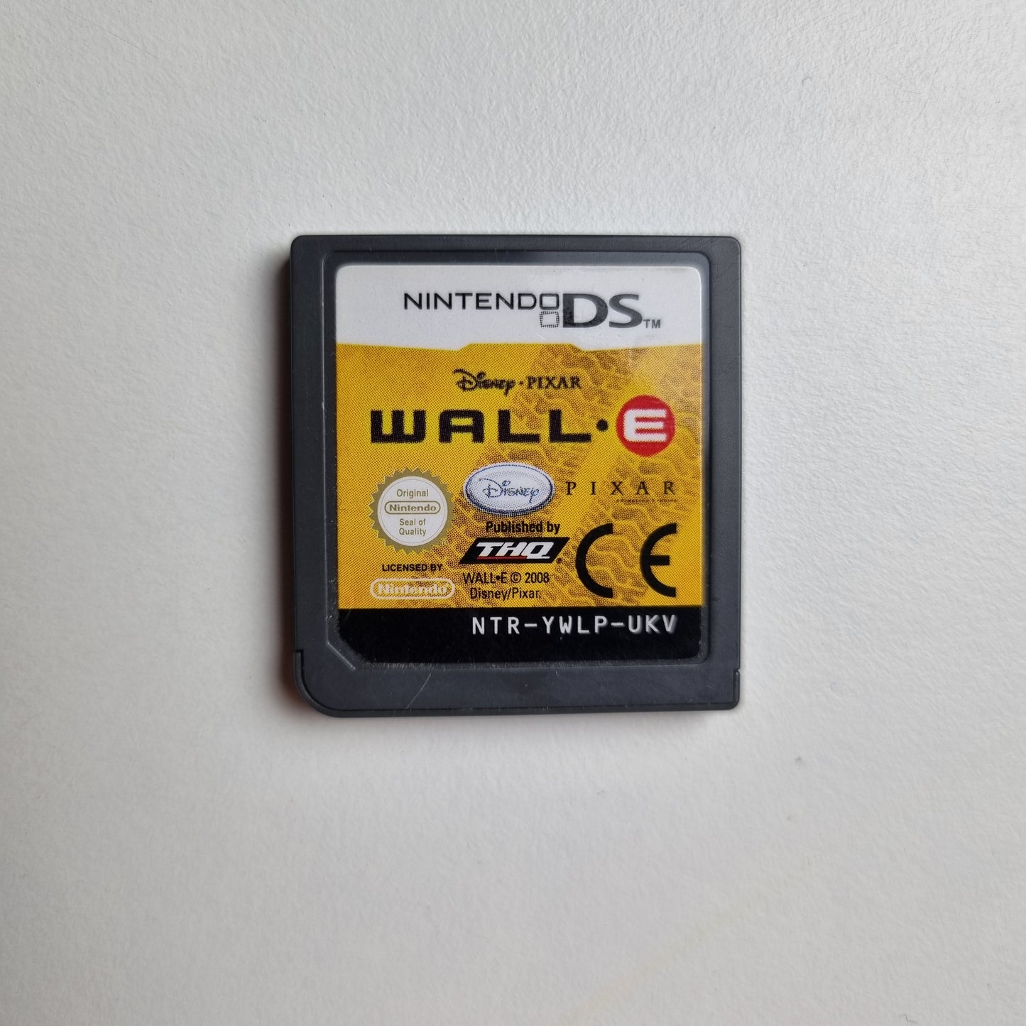 Nintendo DS game cartridge for 'Wall-E' on a light grey background