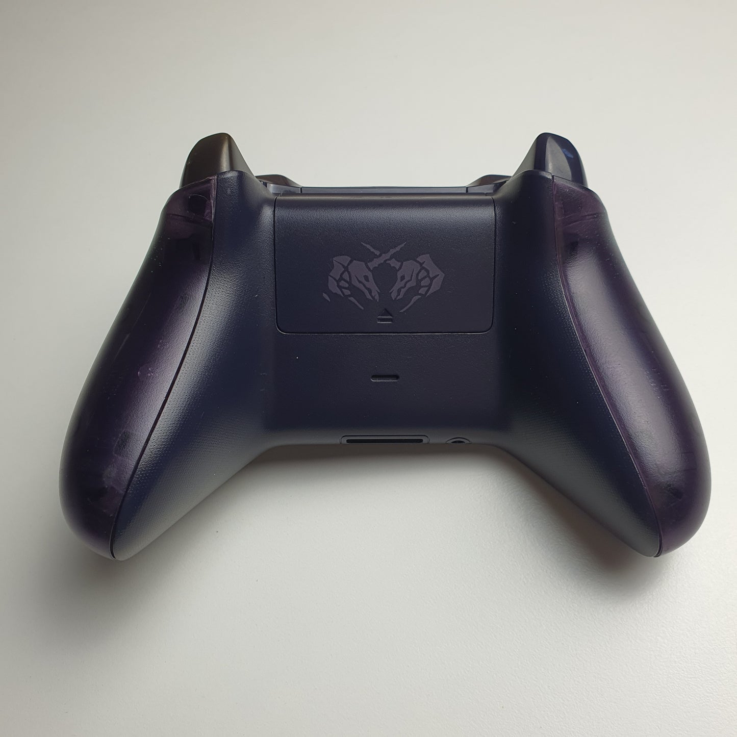 Back of a Xbox One 'Sea of Thieves' controller on a white background