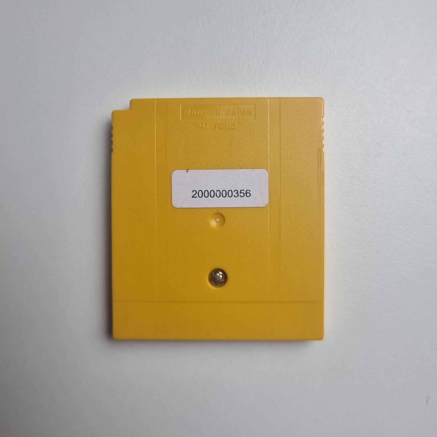 The back of a video game cartridge for 'Pokémon: Yellow Version' on Game Boy.