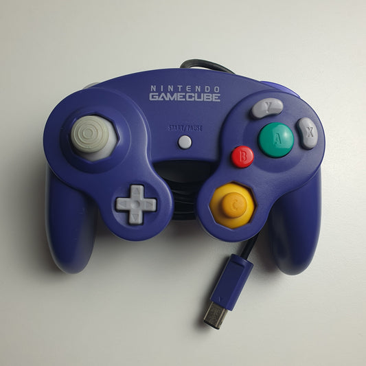 Official indigo Nintendo GameCube controller on a white background.