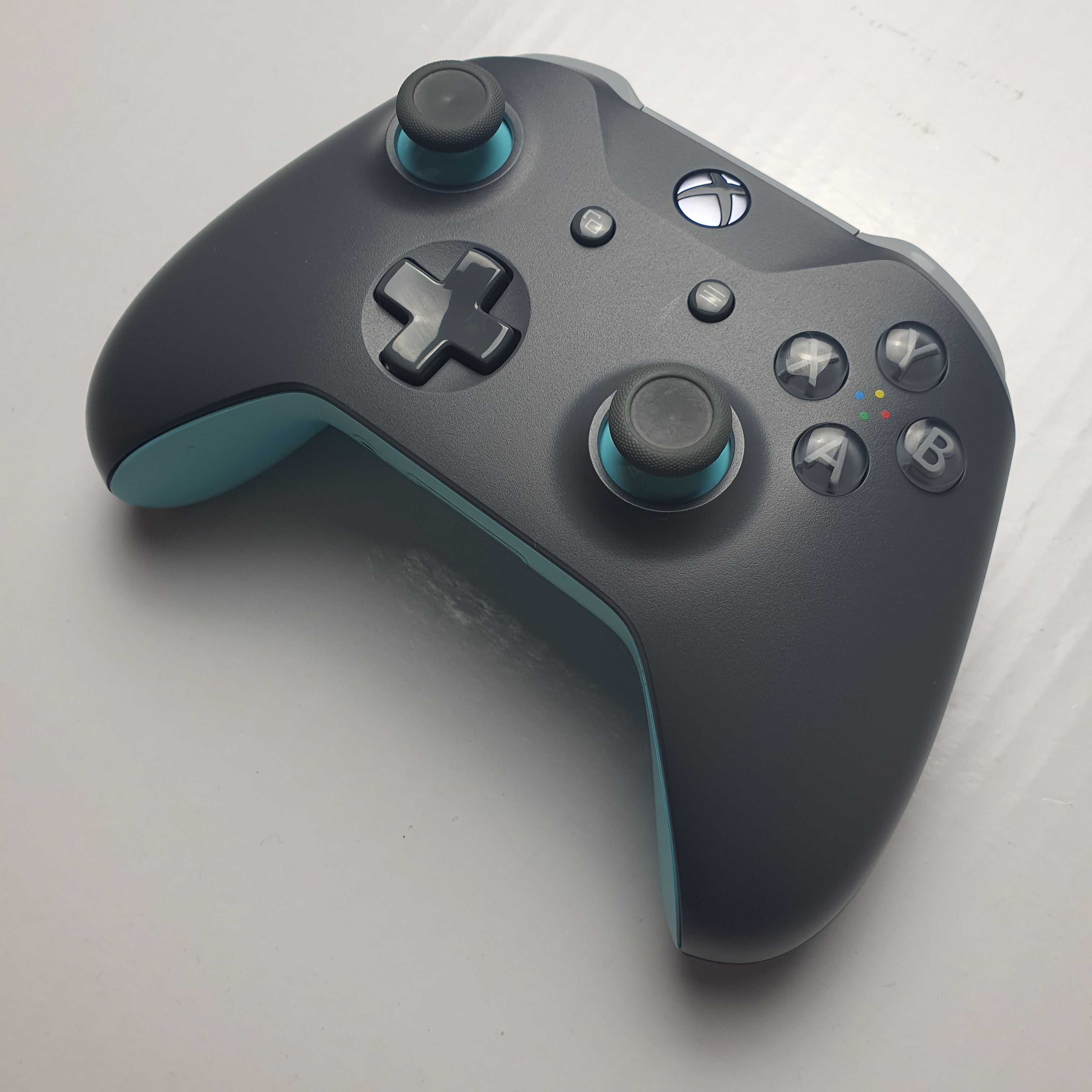 Xbox grey and 2024 blue wireless controller